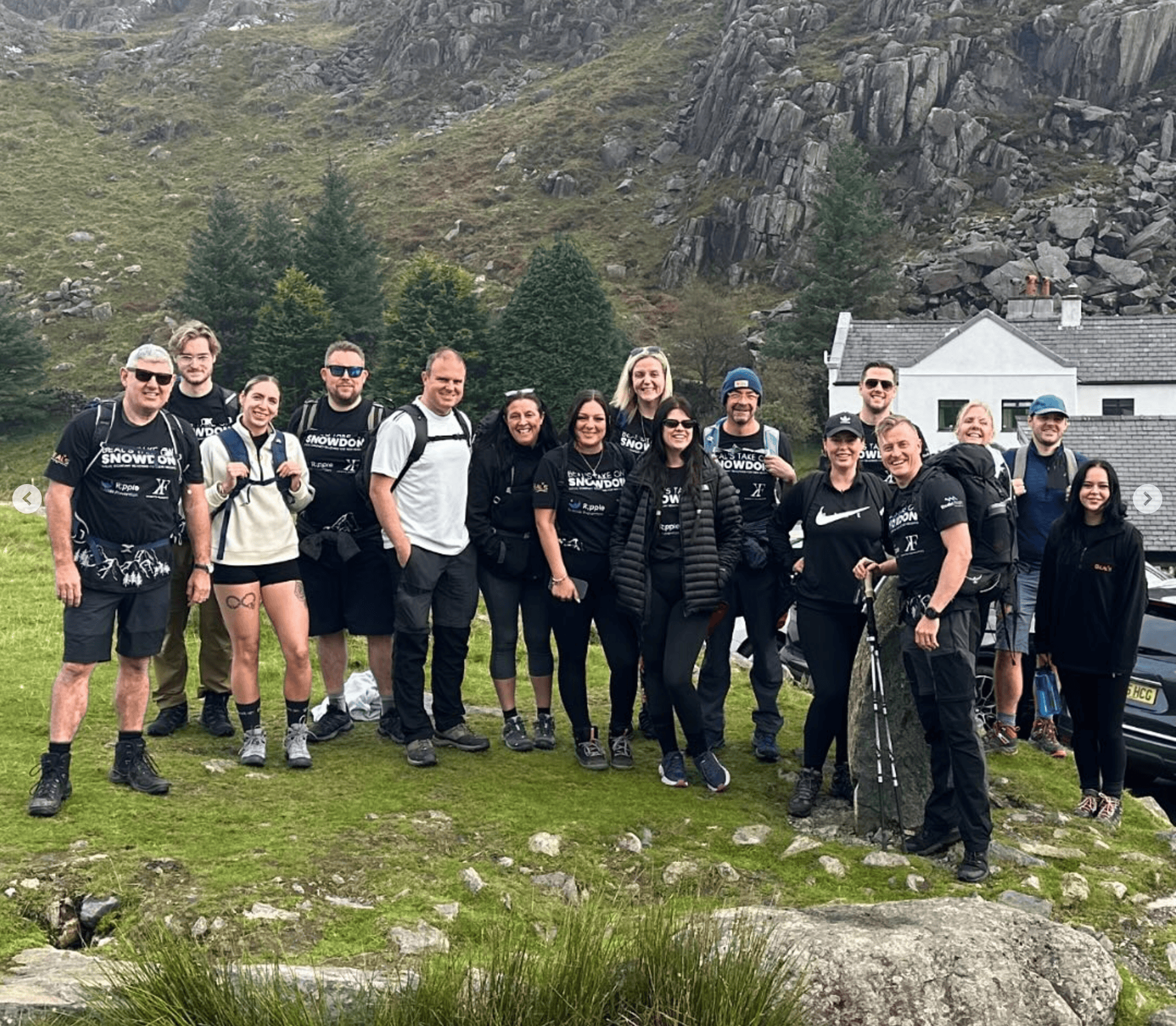 Group of people climbing Mount Snowdon